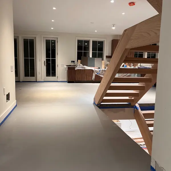 Flooring Installation Services in NJ | #1 Epoxy & Concrete Contractors 8 Elegant and durable basement flooring with a stylish finish, perfect for modern interiors.