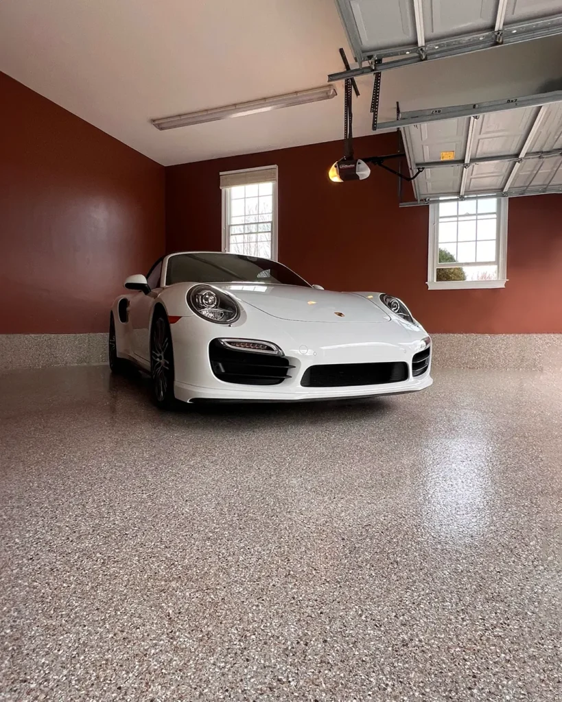 Epoxy floor in garage installed with a sleek and durable residential finish
